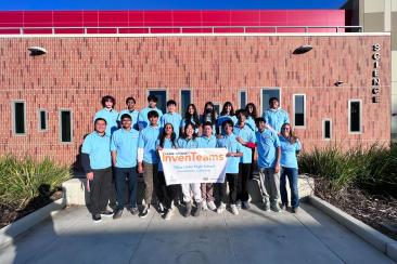 The Mira Loma HS InvenTeam stands with advisors, Franco Canet and Colleen Kelly, for a team photo.