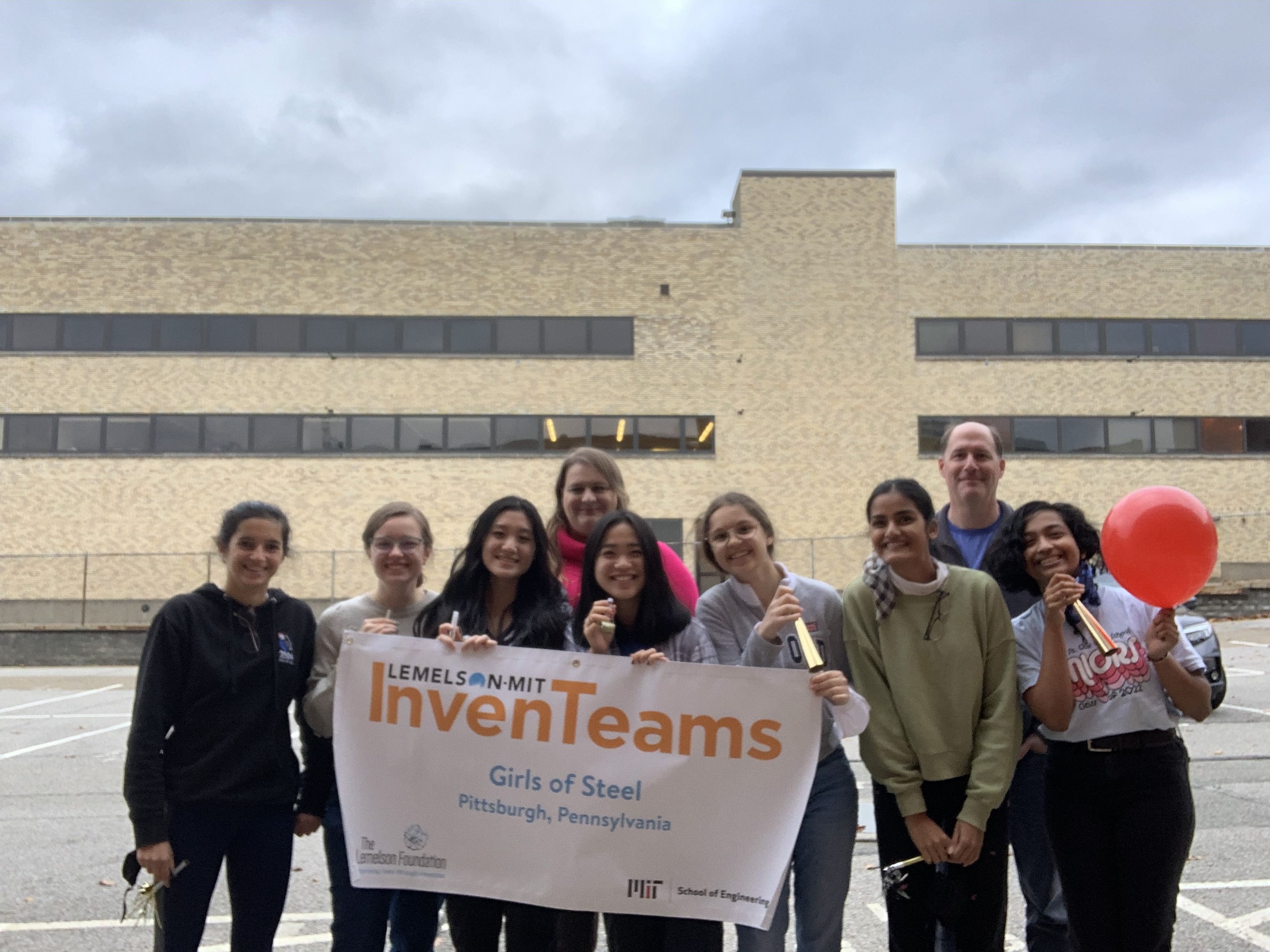 The Buzzband Team with their Lemelson-MIT InvenTeams Banner!