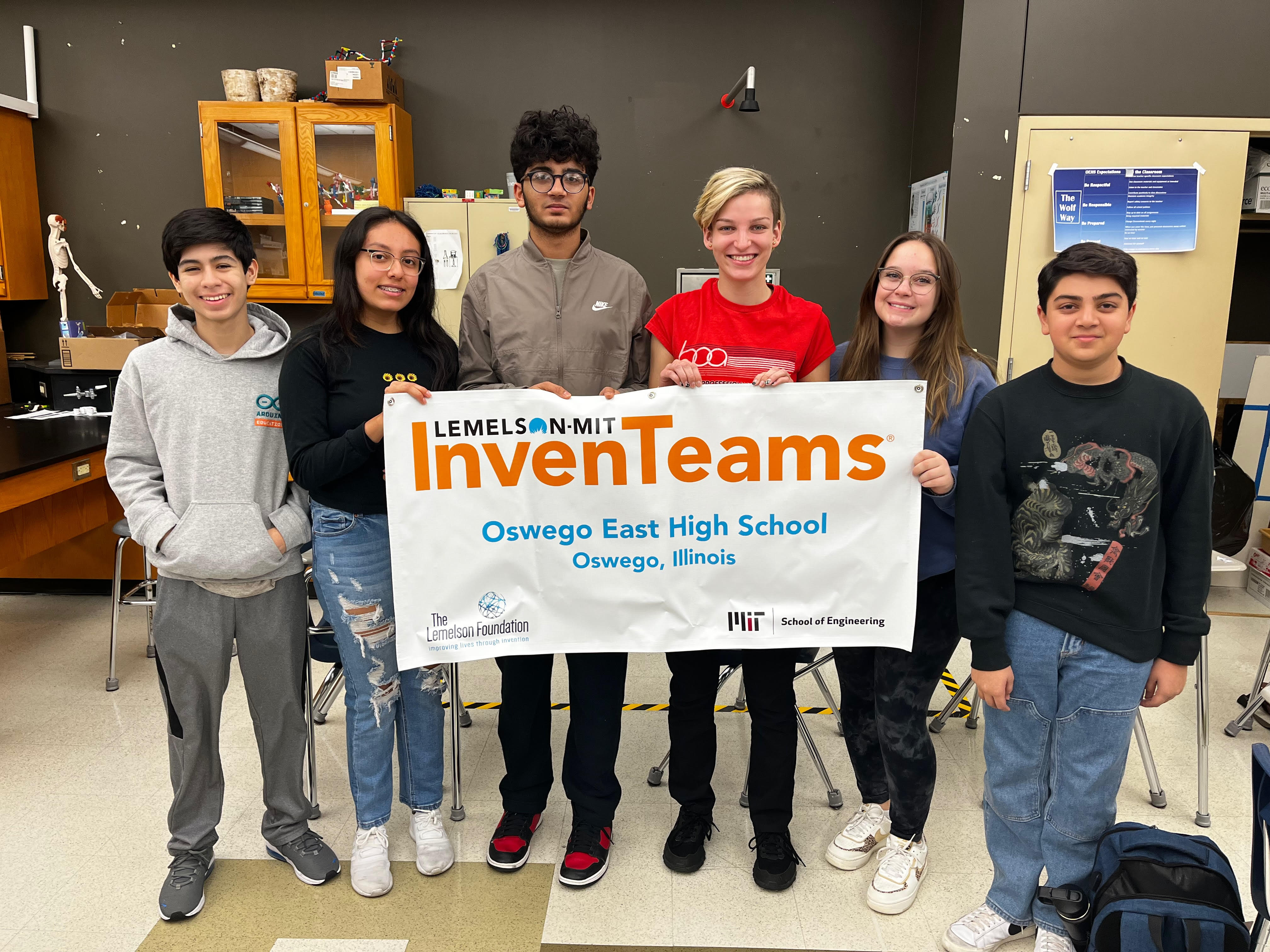 Here is a photo of the Oswego East InvenTeam with their official banner.