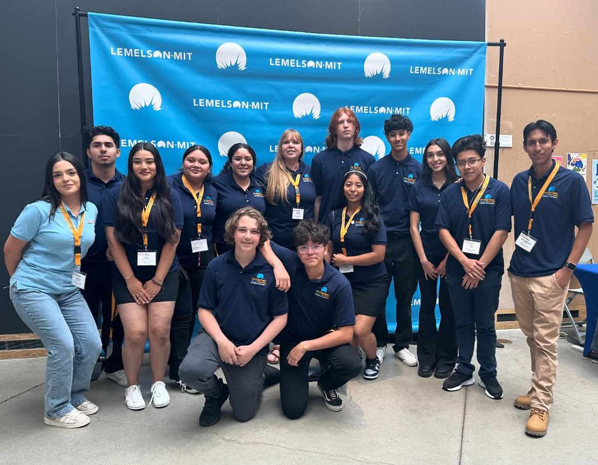 Group of Calistoga students pose in front of a banner at EurekaFest in 2024