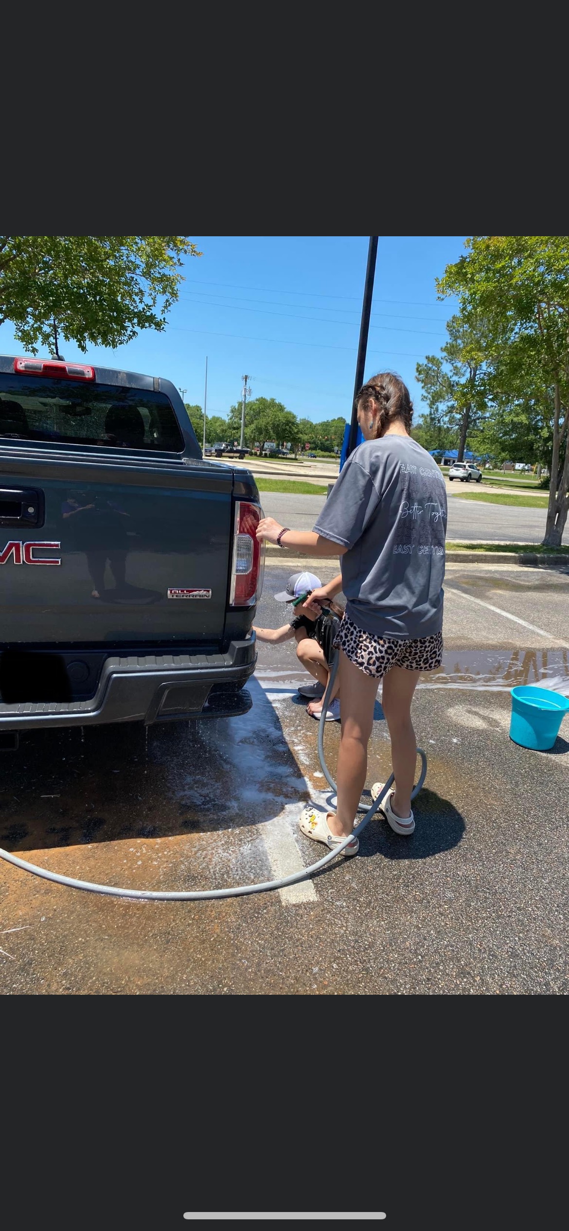 This is our team washing some cars and making some money!