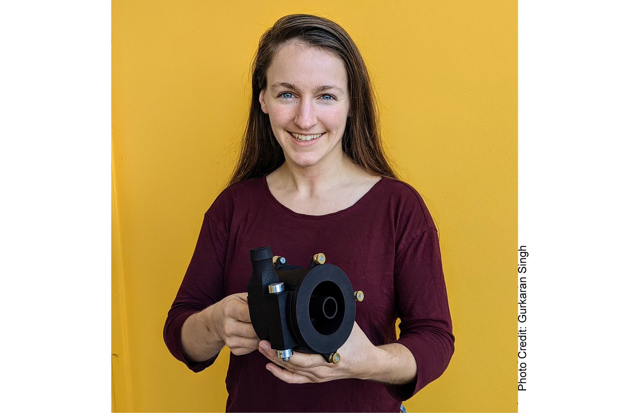 MIT graduate student Hilary Johnson, holding her variable volute pump