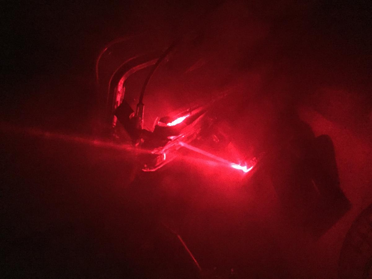 [Using a fog machine to work with the laser]