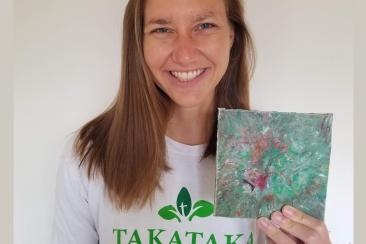 Paige Balcom of University of California, Berkeley with a wall tile made from her machines that convert PET plastic into useable, salable items.