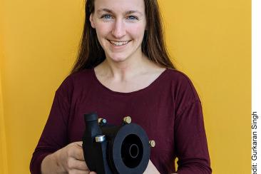 MIT graduate student Hilary Johnson, holding her variable volute pump