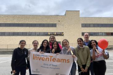 The Buzzband Team with their Lemelson-MIT InvenTeams Banner!