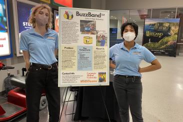 Two BuzzBand members at the Carnegie Science Center outreach event.