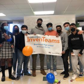 Brentwood High School InvenTeam with their InvenTeams banner